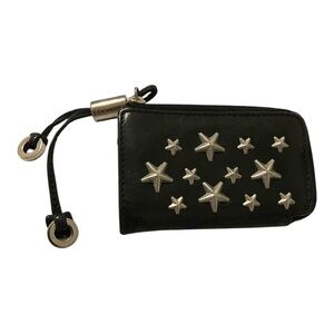 Jimmy Choo EUC Black Star-Studded Leather Pouch.